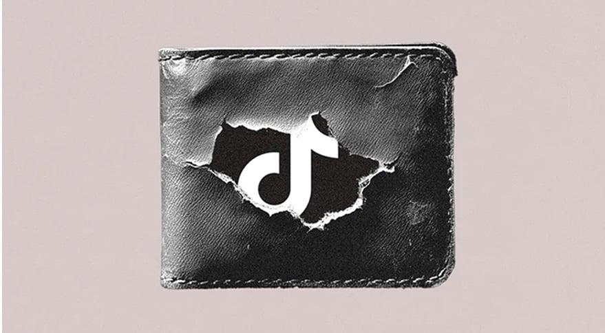 Picture of a wallet with the Tiktok logo on it 